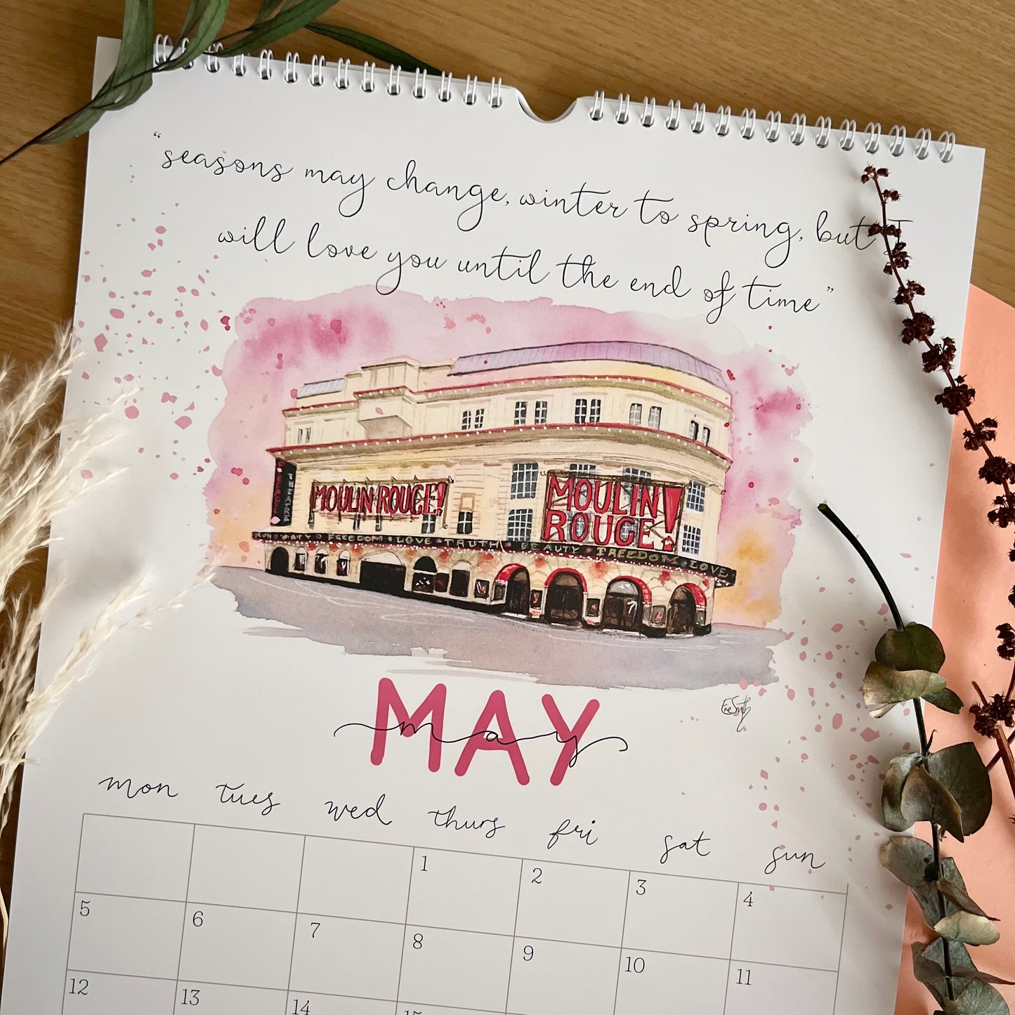 A calendar page for the month of May, featuring original watercolour art of the Moulin Rouge Musical at the Piccadilly Theatre in London’s West End. Painted by London artist and performer, Eve Leoni Smith.